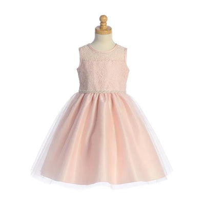 Light pink baby girl dress featuring lace bodice and tulle skirt, displayed on a dress form.