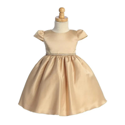 Satin baby girl dress in gold, featuring short puff sleeves and a beaded rhinestone trim around the waist.