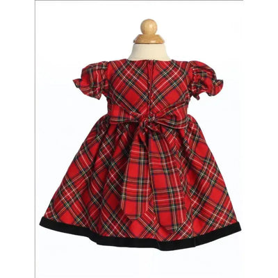 Plaid Christmas dress in red, green, and black featuring puffed sleeves and a tie waist, ideal for festive occasions.