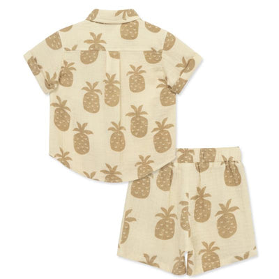 Tan woven short set for baby boys featuring a short-sleeve shirt and matching shorts with pineapple prints.