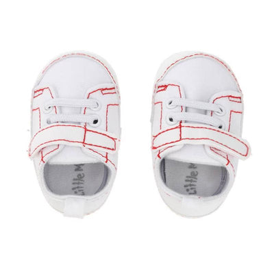 Baby boy sneakers in white with red stitching and Velcro strap, featuring a soft sole for comfort.