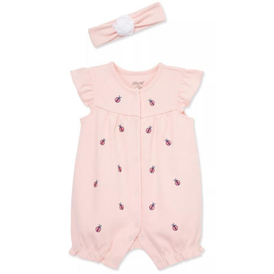 Pink baby girl romper by Little Me with ladybug embroidery, featuring ruffled sleeves and a matching headband.