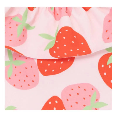 Baby girl swimsuit featuring a pink fabric adorned with red strawberries and green leaves.