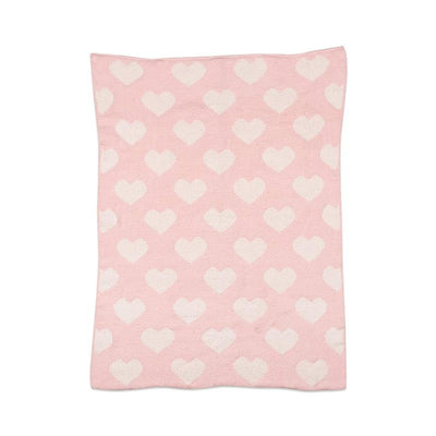 Chenille baby blanket in pink with a pattern of white hearts, designed for warmth and comfort.