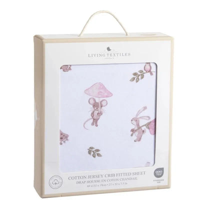 Cotton jersey fitted sheet by Living Textiles featuring a mushroom, mouse, and rabbit design, packaged in a decorative box.