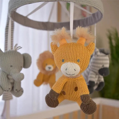 Musical mobile featuring colorful plush animals including a giraffe, elephant, lion, and zebra, designed for nursery decoration.