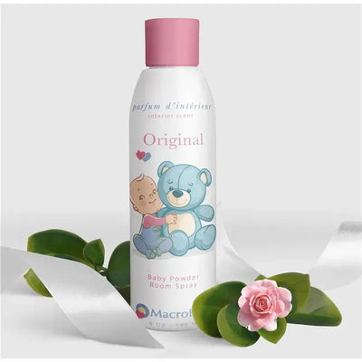 Macrobaby Baby Powder Room Spray, 6 oz, featuring a baby and blue teddy bear on the label, surrounded by greenery and a pink flower.