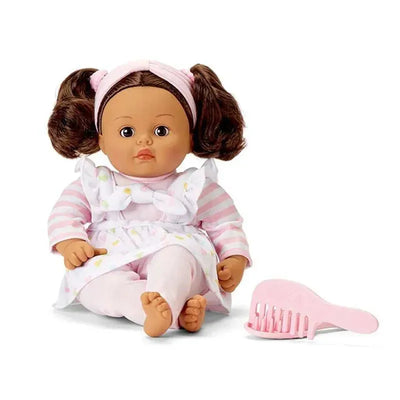 Medium-skinned doll with curly brown hair in pink headband and striped outfit, accompanied by a pink hair comb.