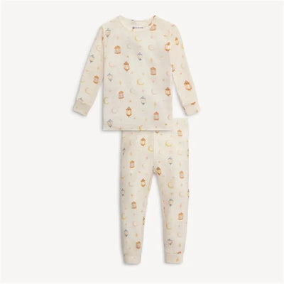 Long sleeve pajama set for babies featuring a soft cream color with lantern and moon patterns.