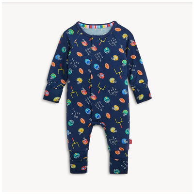Modal convertible coverall featuring a navy base with colorful sports-themed prints and a button-up design.