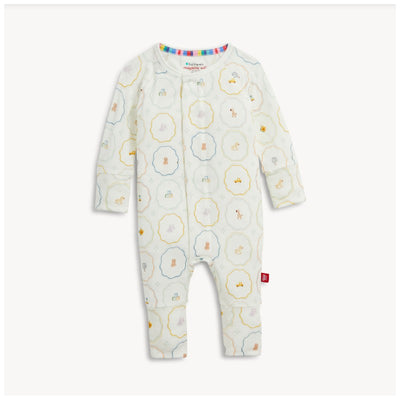 Cream modal convertible coverall featuring playful patterns with animals and toys, designed for infants.