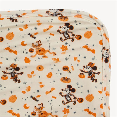 Modal blanket with Halloween-themed design featuring Mickey Mouse and friends in costumes, pumpkins, and colorful decorations.