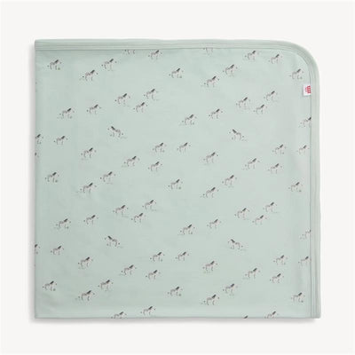Teal modal blanket featuring a playful zebra print, designed for versatile use.