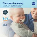 Award-winning MAM AIR Night Pacifier held by a smiling baby in a cozy gray sweater, with a parent smiling beside them.