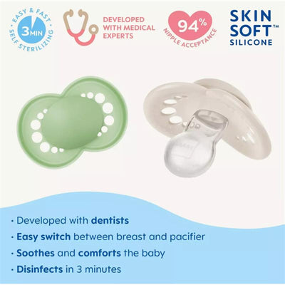 Three-pack of MAM Day & Night pacifiers for girls, featuring a green and a clear design with claims of easy sterilization and comfort.