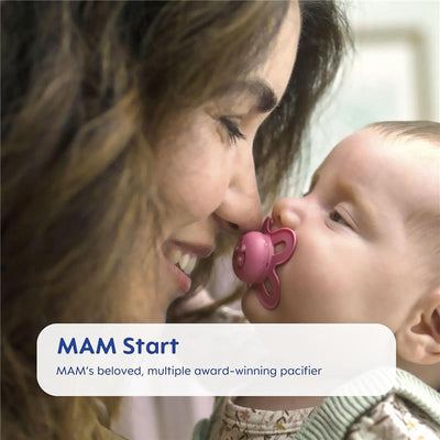 Unisex MAM Start pacifier held by a baby, with a smiling mother leaning close, emphasizing connection and comfort.