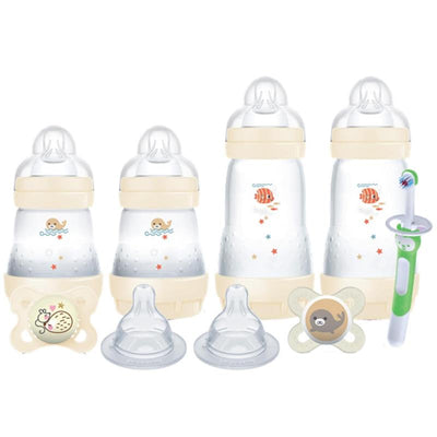 Mam 9Pk Welcome Home Feeding Set includes three baby bottles with playful ocean designs, a pacifier, two nipples, and a toothbrush.