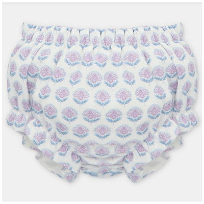 Baby girl bloomer in lavanda with white base, featuring a floral pattern in pink and blue with ruffled edges.