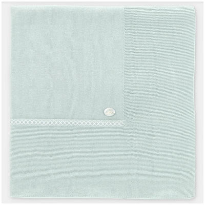 Light pink Martin Aranda Blanket Knit Edmonton, featuring textured knit sections and a decorative button detail.