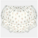 Woven fabric bloomer featuring a pattern of small trees in muted colors on a light background.