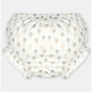 Woven fabric bloomer featuring a whimsical tree print in soft pastel colors.
