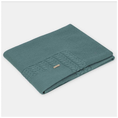 Blue-grey Draylon sweaterknit blanket with textured knit pattern and a small tag, folded neatly.