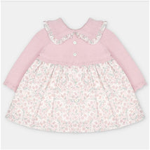 Martin Aranda dress featuring a sweater knit bodice in dusty rose with a floral fabric skirt and ruffled collar.