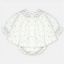 Woven fabric set dress and bloomer in white with polka dots, featuring smocked neckline and button closures.