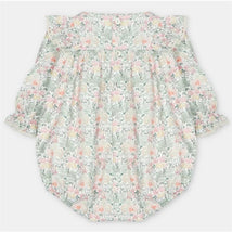 Short romper in Pravia Green with floral pattern, featuring puffed sleeves and button closure at the back.