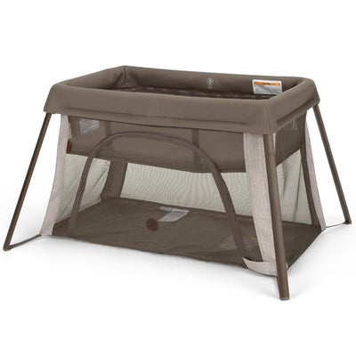 Maxi-Cosi Calao Travel Playard with infant bassinet feature in truffle color, showcasing mesh sides and a portable design.