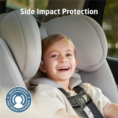 Convertible car seat with a smiling child, featuring side impact protection branding and safety certification badge.