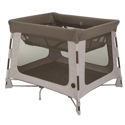 Maxi-Cosi Swift Baby Playard in Truffle color with a soft top rail and mesh sides for visibility and ventilation.