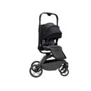 Maxi-Cosi Tana 360 rotating modular stroller in Onyx Heritage, featuring a sleek black design and spacious seat.