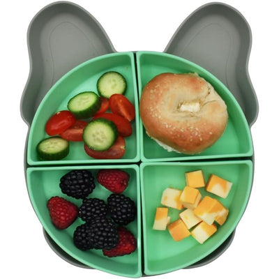 Melii Silicone Plate featuring four removable dividers, holding a bagel, tomatoes, cucumbers, berries, and cheese cubes.