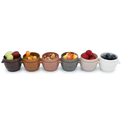 Set of five Melii 2 oz Snap Containers in neutral colors, filled with fruits, nuts, and snacks.