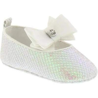 White Michael Kors baby girl crib shoe with an iridescent sheen and a large white bow on the front.