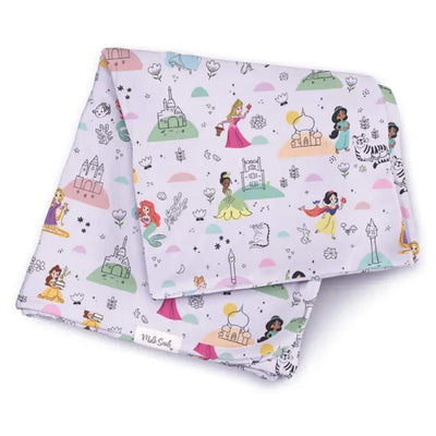 Swaddle blanket featuring Disney princesses and castles on a light purple background, ideal for babies.