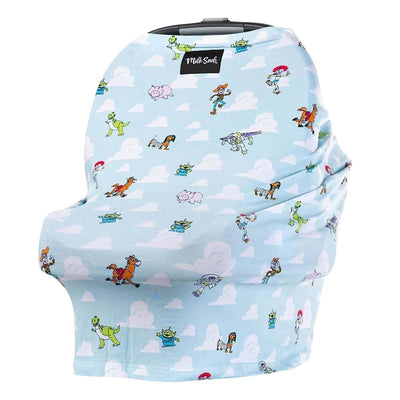 Multifunctional cover featuring a light blue fabric with Disney Pixar Toy Story characters and clouds.