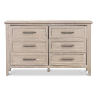 Monogram Beckett 6 Drawer Double Dresser in Sandbar finish, featuring six spacious drawers with sleek dark handles.