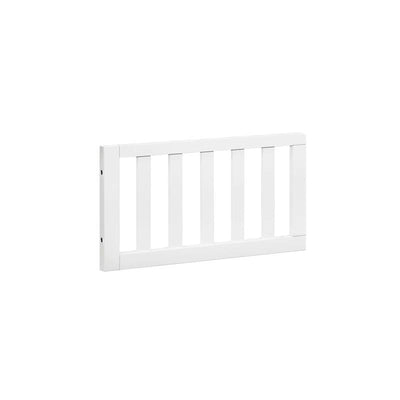 White toddler bed conversion kit guard rail featuring slatted design for safety and stability.