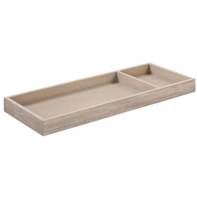 Universal wide removable changing tray in Sandbar color, featuring a spacious main compartment and a smaller side section.