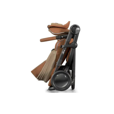Mima Creo Single Stroller in Mocha Cream, featuring a sleek design and a folded position for easy storage.