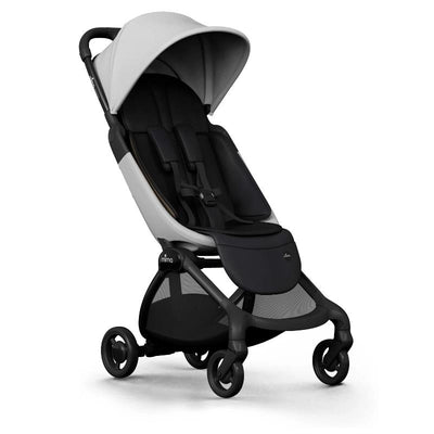 Mima Miro Compact Stroller featuring a black chassis and white seat, designed for easy maneuverability and comfort.
