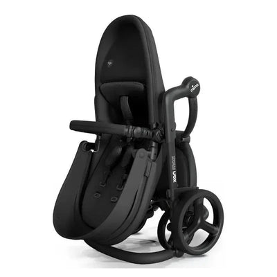 Black Mima Xari Max Stroller with a black chassis and seat, featuring a sleek, modern design and maneuverable wheels.