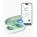 Momcozy Smart Baby Thermometer with a light green carrying case and smartphone app displaying real-time temperature of 98.62°F.