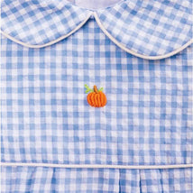 Baby blue gingham bubble dress featuring an orange embroidered pumpkin at the center and a classic collar.