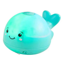 Mud Pie - Blue Light-Up Spray Whale Bath Toy Image 1