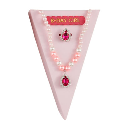 Hot pink birthday jewelry set featuring a necklace with a pink pearl and gemstone pendant, and a matching ring.