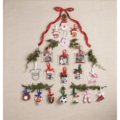 Red Bow Frame Ornament displayed as part of a Christmas tree arrangement with various seasonal ornaments and photo frames.