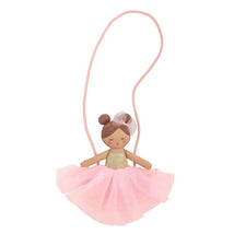 Brunette ballerina purse featuring a doll with a pink tulle skirt and a gold top, ideal for young dancers.